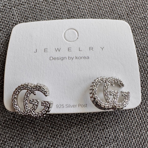 Jewelry - CZ silver post statement earrings